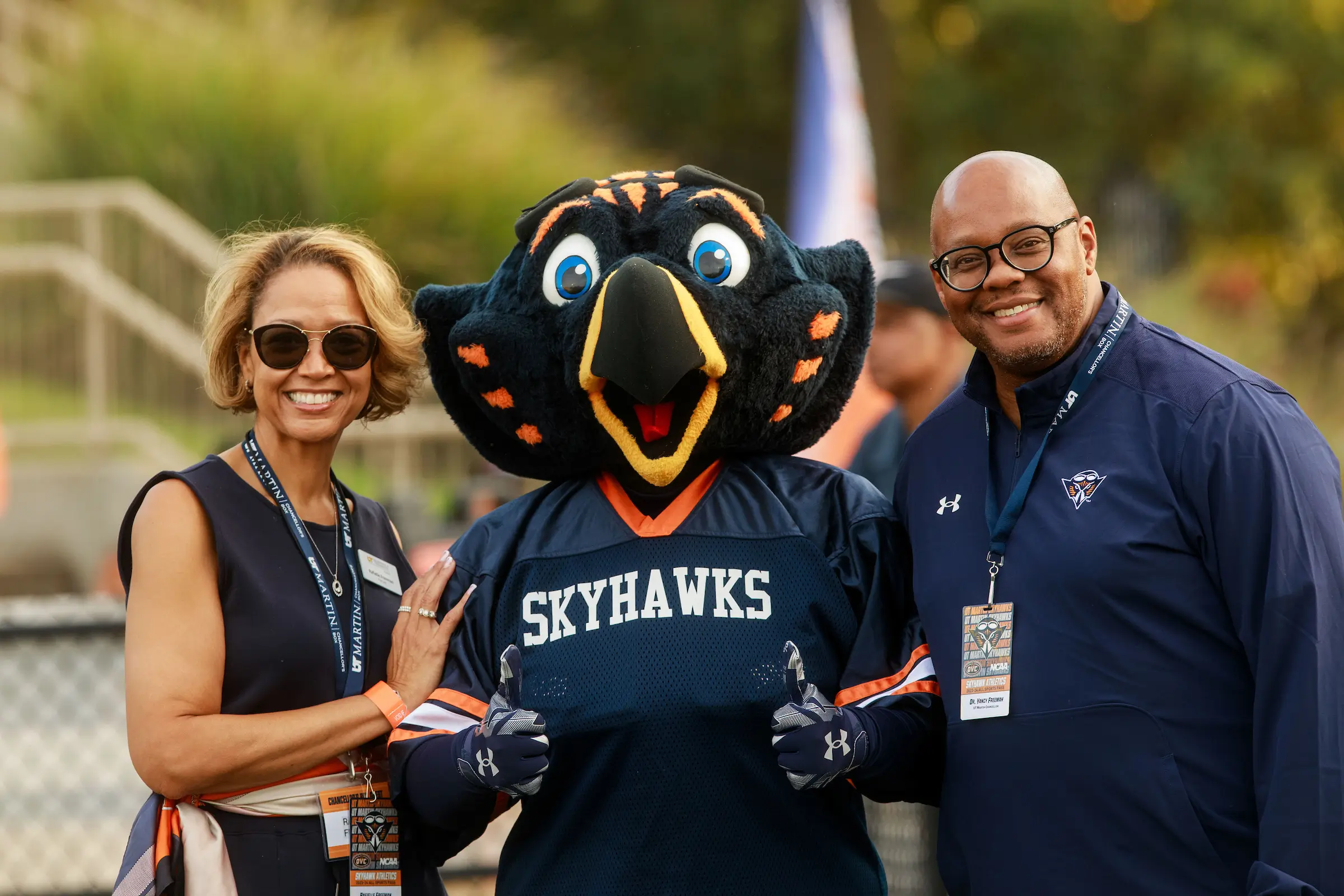 Chancellor Yancy Freeman with Captain Skyhawk and First-Lady Rafielle Freeman at a campus event.