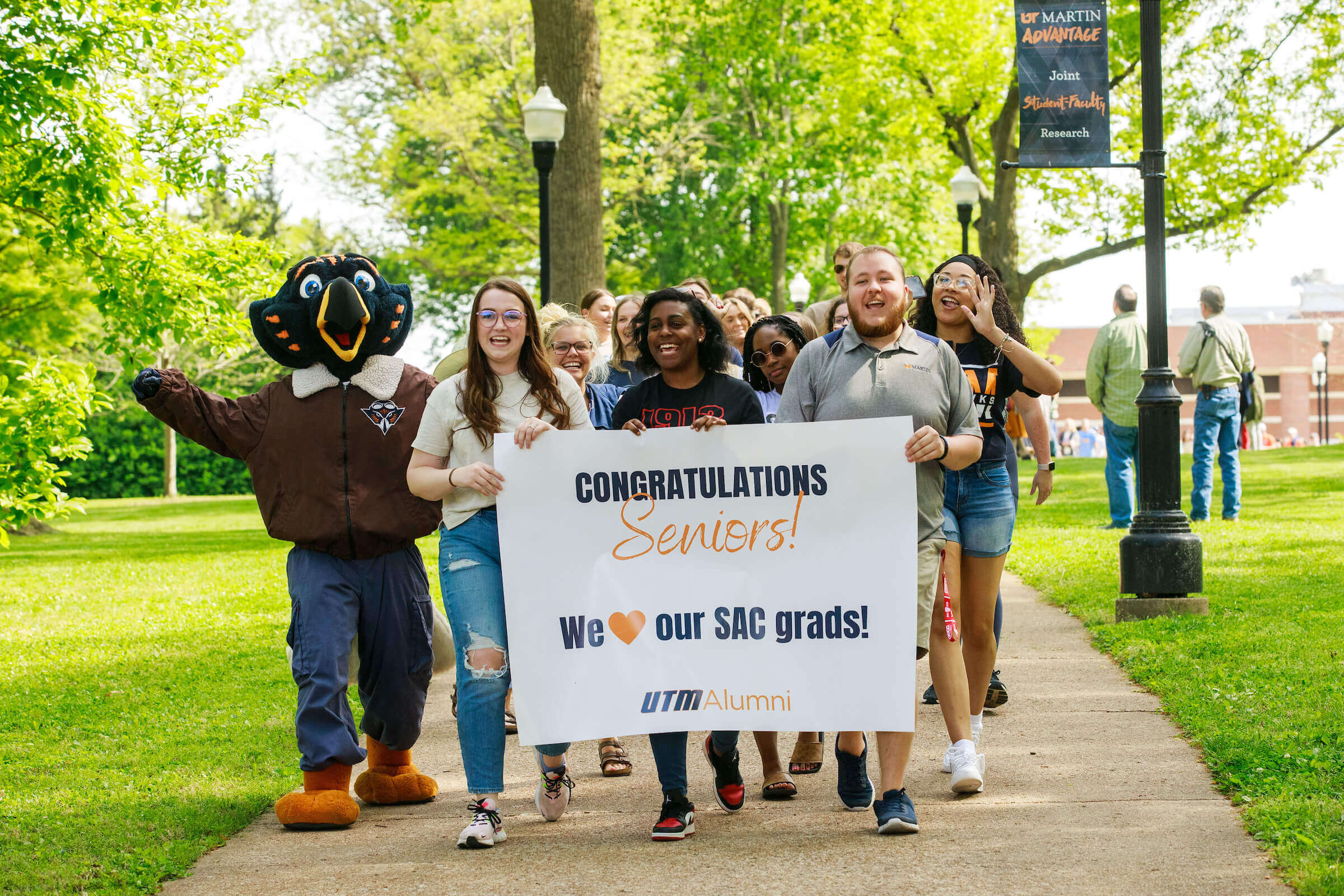 Captain Skyhawk joins a procession of soon-to-be graduates during our annual UTM Senior Walk.