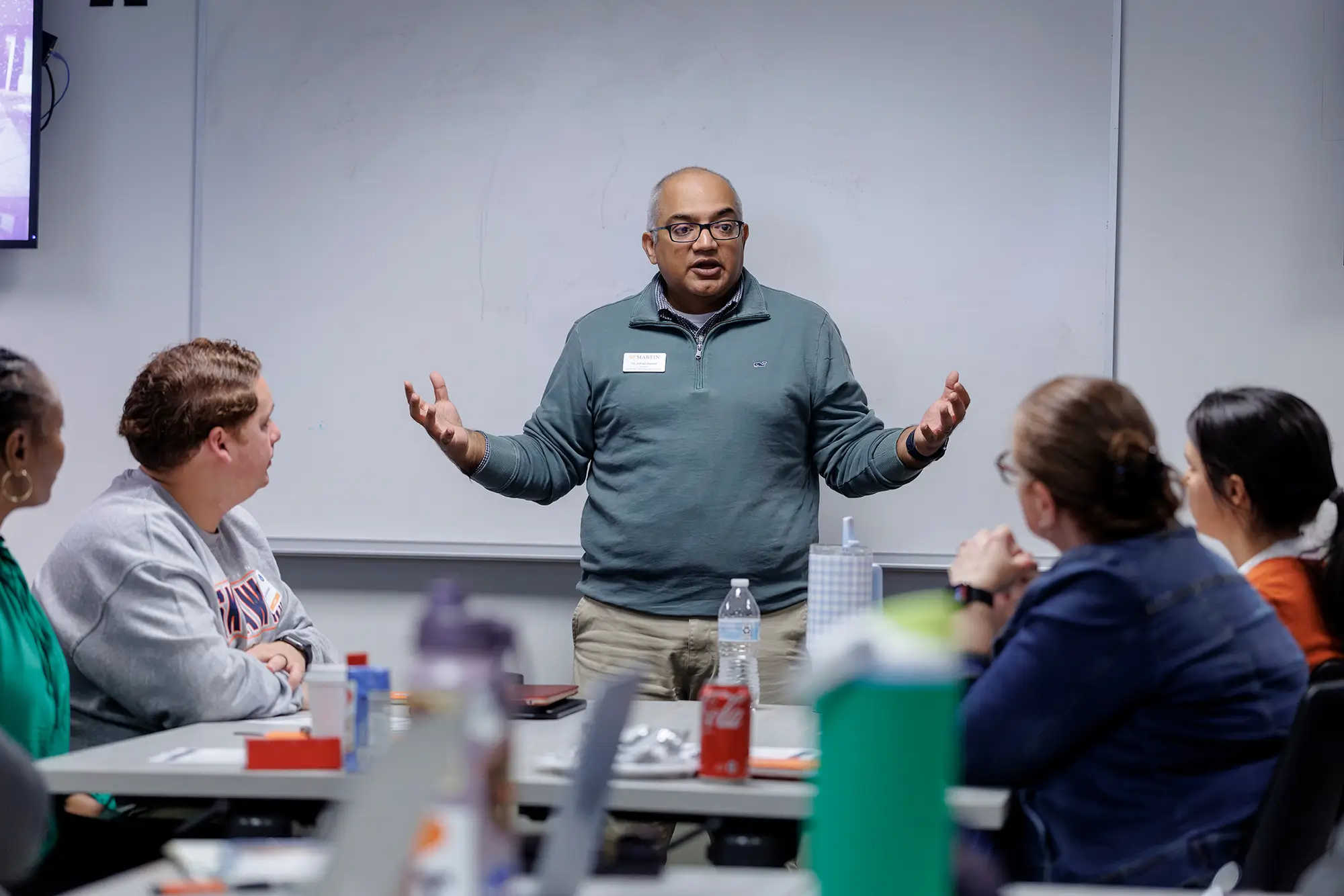 Students reviewing materials together in a UT Martin nursing lab.